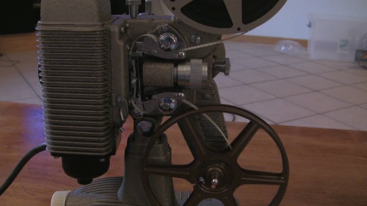 Loading and Rewinding an 8mm Projector (Revere 85) - YouTube