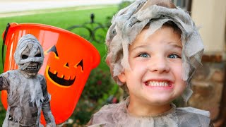 TRICK or TREAT for HALLOWEEN CANDY ! Caleb Pretend PLAY Scavenger Hunt in Spooky COSTUMES with MOM!