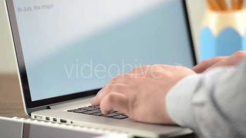 Businessman Hands Are Typing On Laptop Keyboard - Stock Footage | VideoHive 15187126
