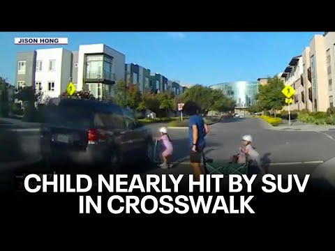 Caught on camera: Child nearly hit by car in crosswalk