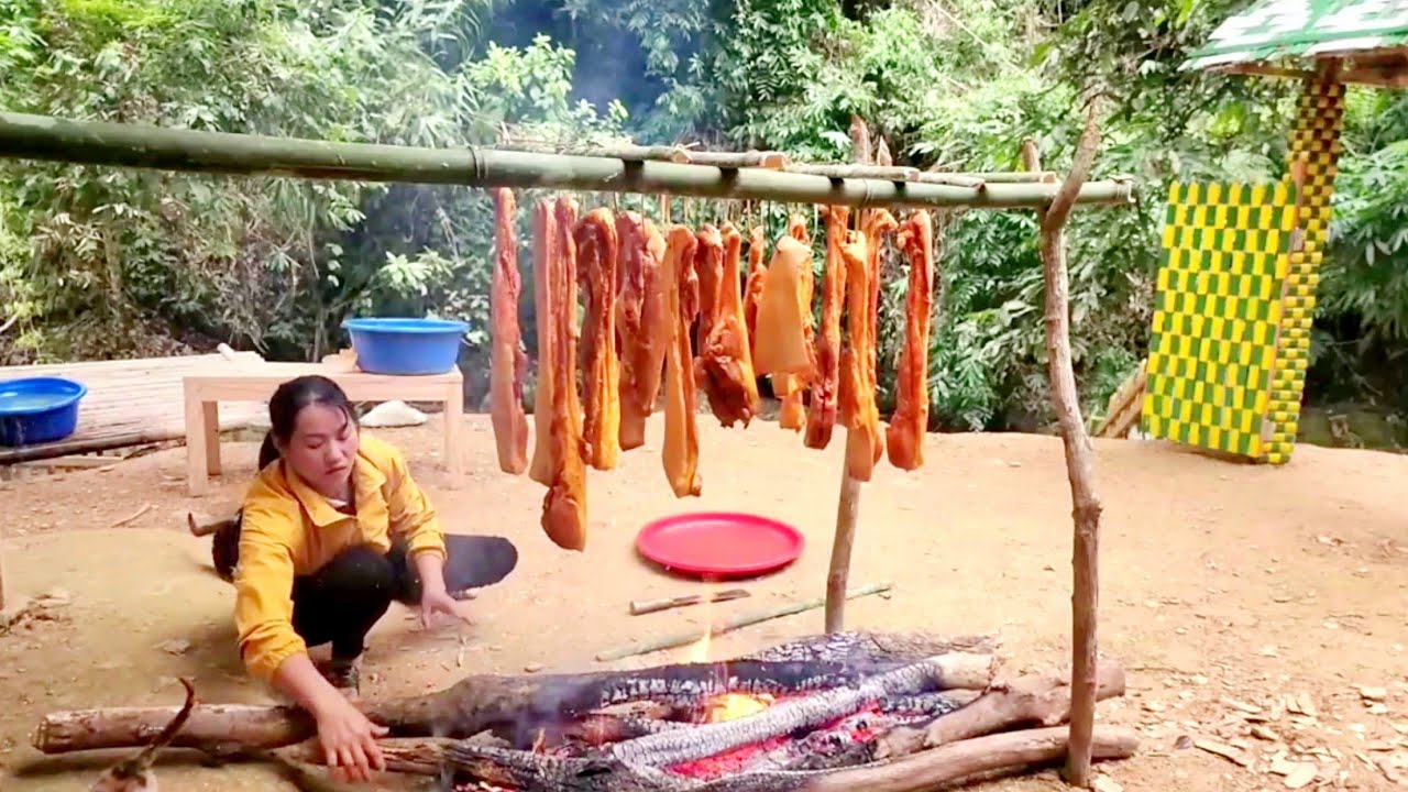 Traditional black pork smoking technique for 180 days preservation.