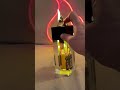 Acrylic Table Lighter with a bottle of Chivas Regal Blended Scotch Whiskey Bottle inside.