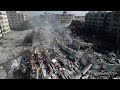 Drone video of flattened buildings and debris in Gaza