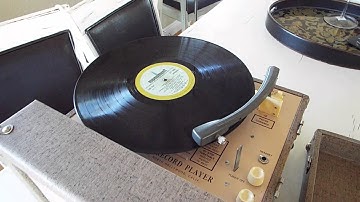 Airtronics 300A manual CLASSROOM record player.  Playing a 33.3 LP record.