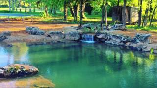 Plano, Dallas Backyard Swim Pond That Stays Crystal Clear Water In DFW, Texas This awesome swim pond was a super big pond that is crystal clear!
