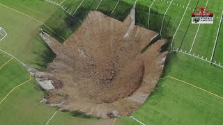 Video shows massive sinkhole open up in the middle of soccer field in Illinois