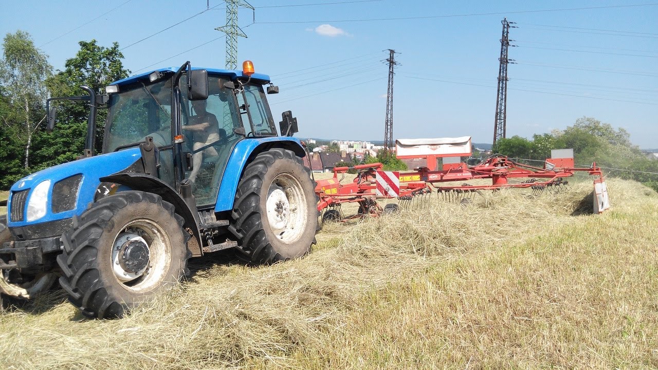 New Holland TL100A, TS135A | Making hay