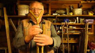 Demonstrating how a thumb stick is made. Its a natural walking stick series 7