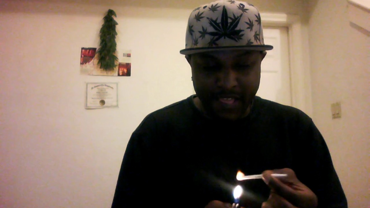 smoking a joint of  herijuana