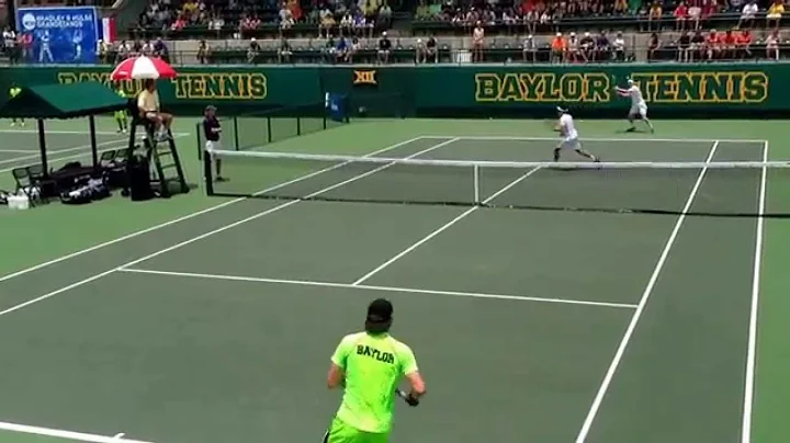 Zsiga hammers a forehand past Kwiatkowski at the net