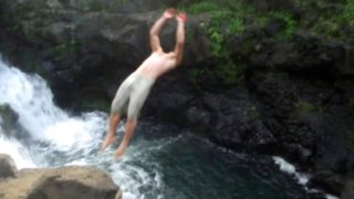 Waterfall cliff jumping in Hawaii Waterfall cliff jumping in Hawaii