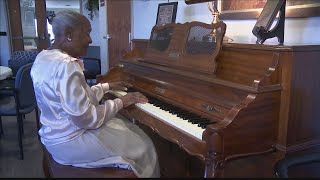 Henderson woman celebrates 100th birthday with music and exercise