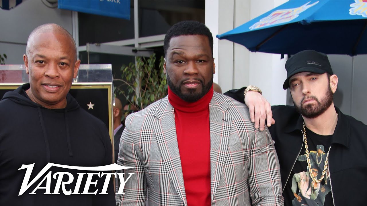 50 Cent getting his Star on the walk of fame while flanked by Dr Dre and  Eminem. Some white-hot kicks on…