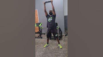 Desenvolvimento de ombros com anilha