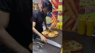 #fastfood #pizza #itspizzatime #pizzalover #pizzapie #fastfoodpizza #food lahori spicy pizza