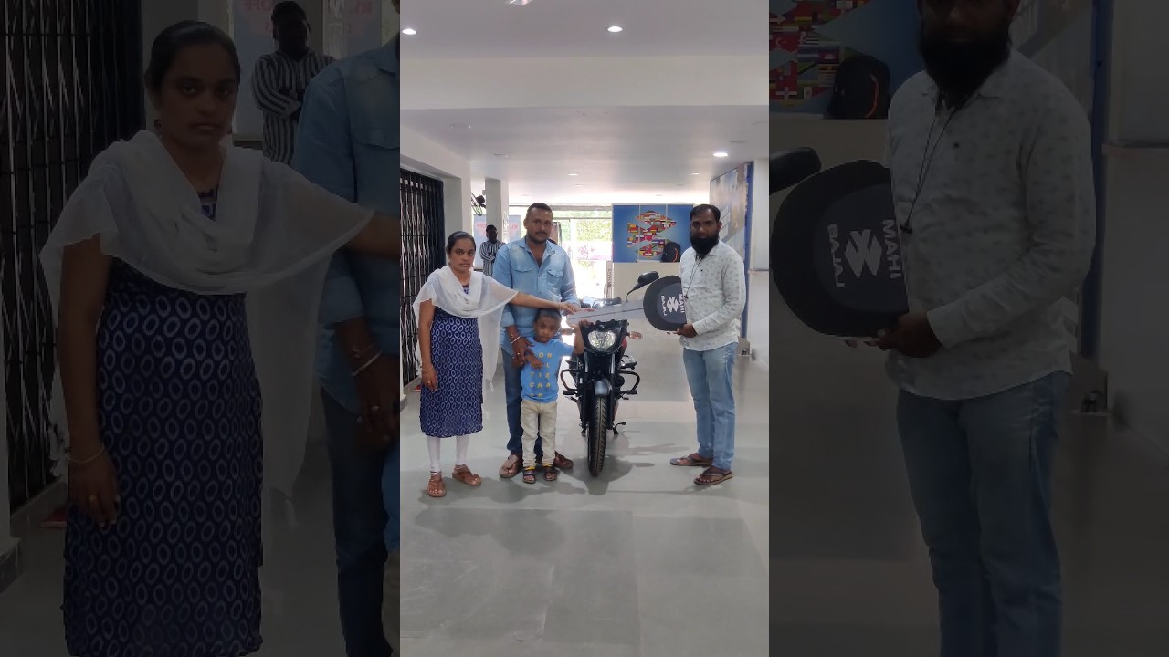 Taking delivery of new Bajaj Pulsar 125 for my mamaya