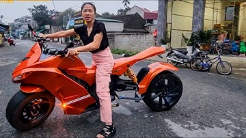 The husband built a super motorbike for his beautiful wife.