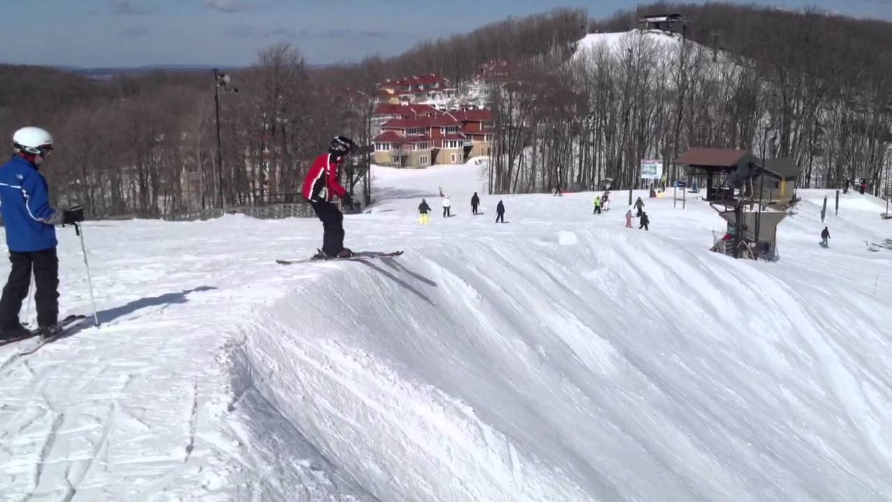 Josh Struble jumping into the gorge while skiing at Crystal - YouTube