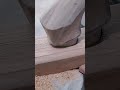the process of installing a piece of wood in a hole that has been made by a worker #wood