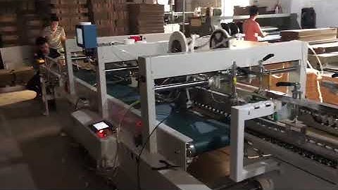auto application system of double adhesive tape and tear tape for corrugated and cardboard