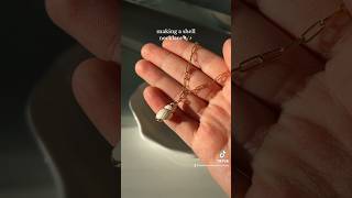 Making a shell necklace!