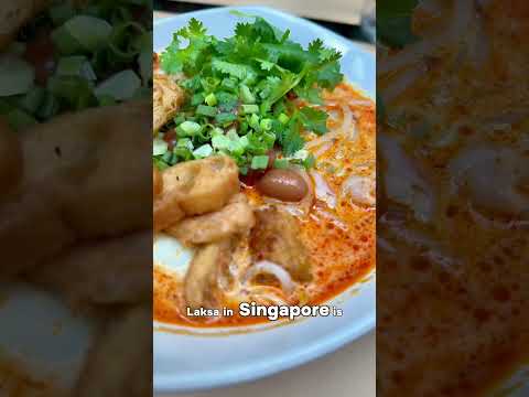 Laksa in Singapore is a beloved spicy noodle soup