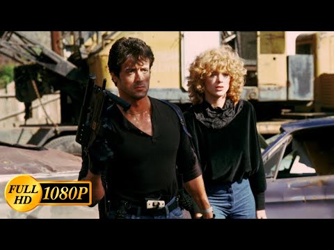 Sylvester Stallone and Brigitte Nielsen defend themselves from bandits / Cobra (1986)