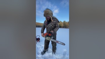Setting minnow trap through the ice