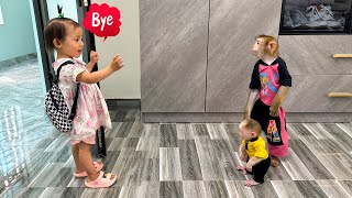 Diem kissed Monkey Kaka and Monkey Mit goodbye while going to school