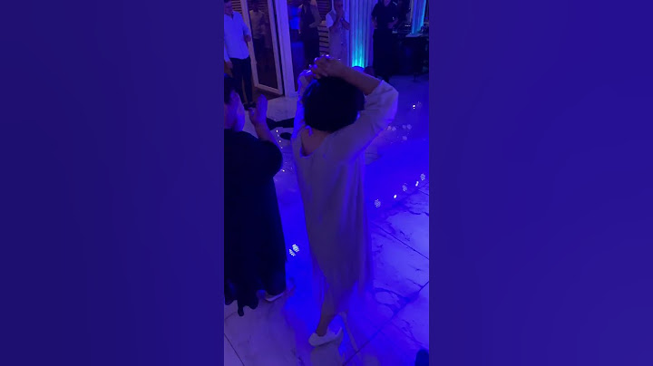 Guys drop a huge wedding cake and fall in it!
