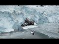 600ft Tall Calving Glacier causes Tsunami Wave for Surfers Below