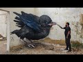 Baby crow spray painted on corner wall