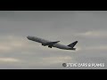 United Airlines Star Alliance livery Boeing 777-200ER N76021 taking off from London Heathrow to IAD