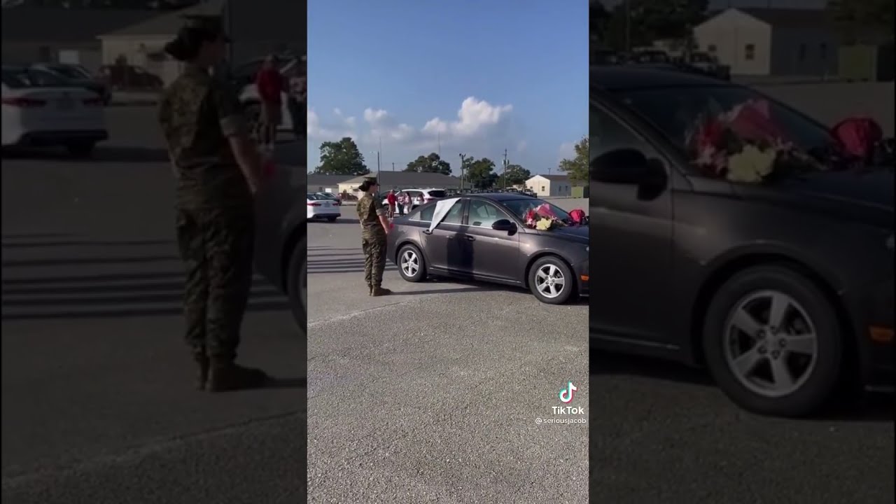 U.S. Marines salute the car owned by Marine Sgt. Nicole Gee, who was killed in Afghanistan
