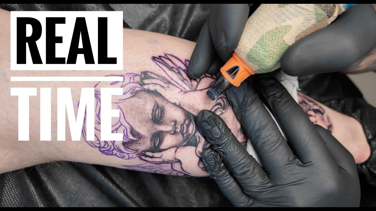 REAL TIME ANGELS TATTOO
