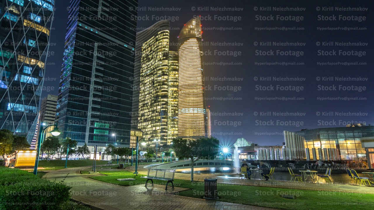 Skyscrapers in Abu Dhabi Skyline at night timelapse hyperlapse, United Arab Emirates