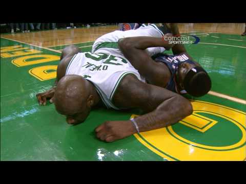 Shaq "Cuddles" with Kwame Brown