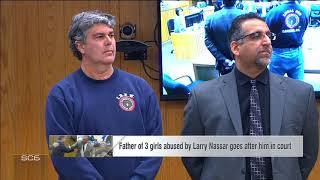 Father who attempted to attack Nassar issues apology