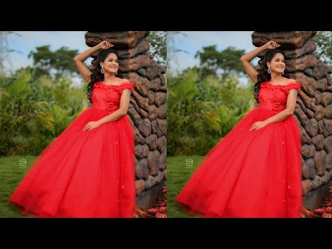 A beautiful asian woman poses in a wedding dress in a tropical natural  setting Stock Photo - Alamy