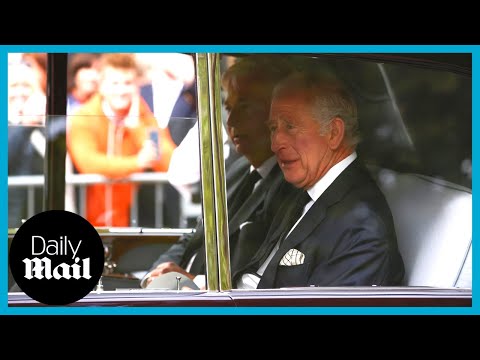 King charles iii arrives at buckingham palace ahead of queen elizabeth ii's procession