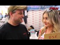 Pbn model julija interviews an attendee at the miami boat show 2