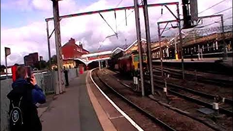 Colas rail tracklayer DR 73942 enters Crewe Station  30/8/2023