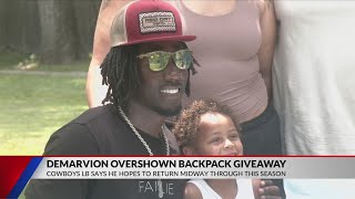 Cowboys linebacker DeMarvion Overshown gives away school supplies in Arp City Park