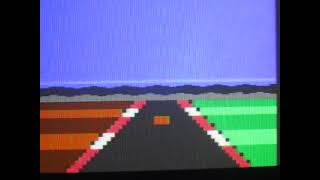 Trying out graphic ideas for PETSCII POLE POSITION type game with FAKE rasters in Commodore 64 BASIC