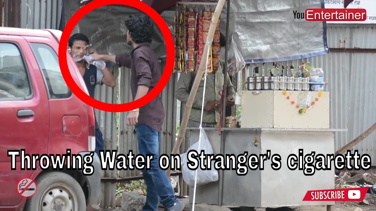 Throwing Water on Strangers Cigarette.(Prank Gone Wrong) - YouEntertainer