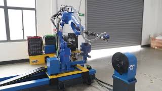 Head and tailstock positioner robotic welding station with robot mounted on RTU track