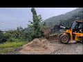 jcb wheel loader clearing dirt from the road || jcb wheel loader dozing dirt || wheel loader video