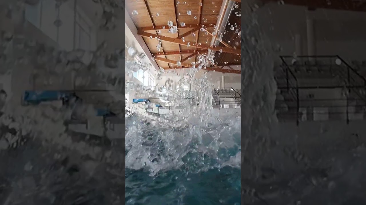 Elegant Dive: Slow Motion Pool Splash - DJI Osmo Action 4
