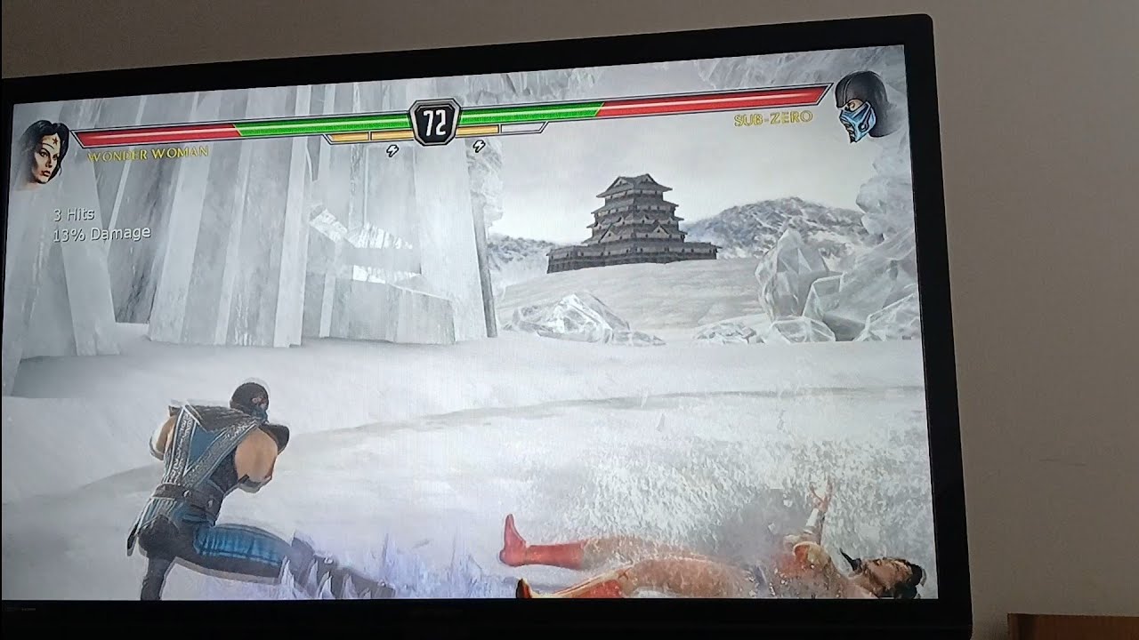 Mortal Kombat vs Dc Universe  Sub Zero Attacks to Ice Slide Combo on Wonder Woman Ryona