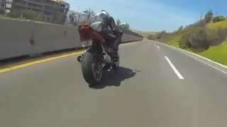Suzuki SV1000S (one handed) vs Honda CBR954RR Suzuki SV1000S (one handed) vs Honda CBR954RR